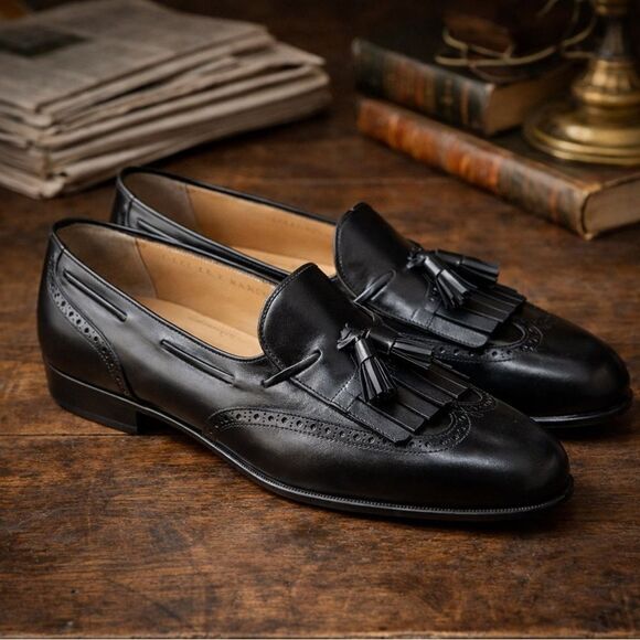 Salvatore Ferragamo black kiltie tassel wingtip loafers main image 8